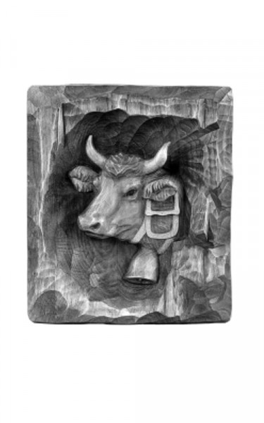 Head of cow in relief